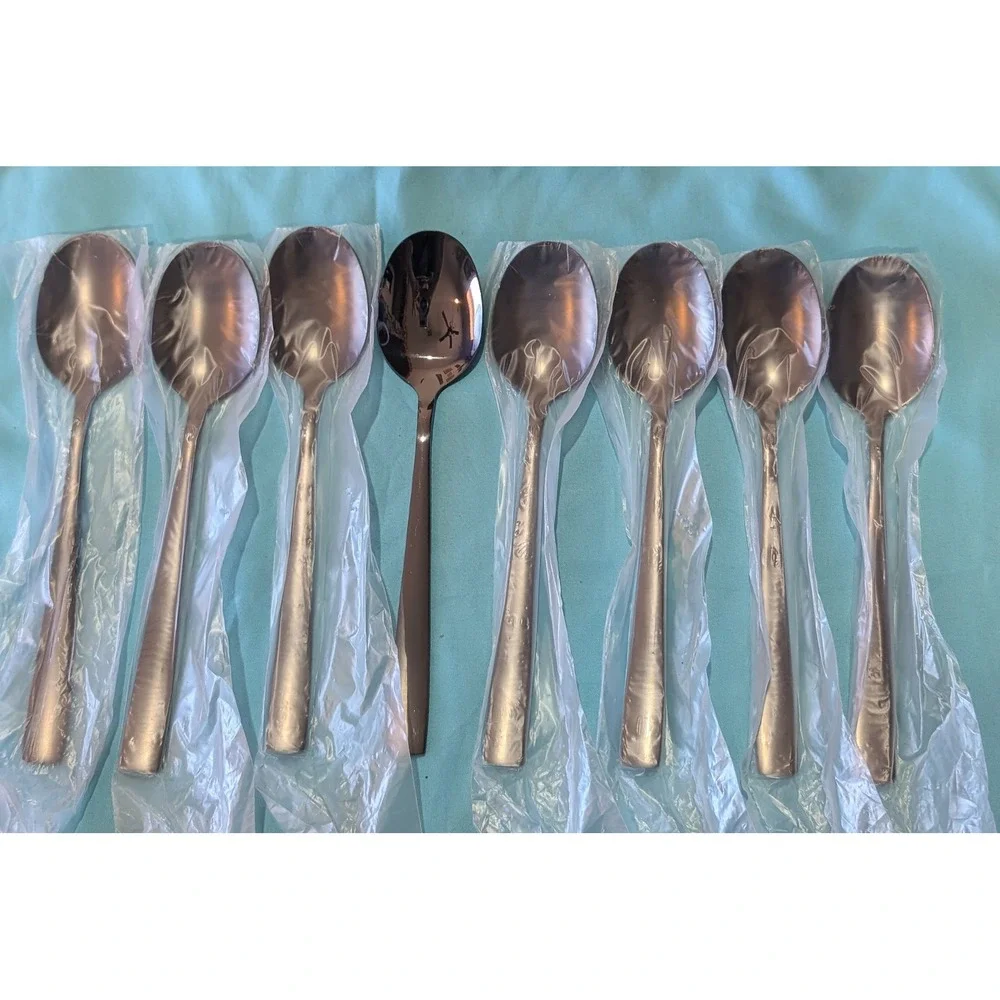 8‎ larger Black Spoons 7